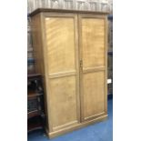 A MAHOGANY TWO DOOR WARDROBE