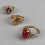 THREE DRESS RINGS