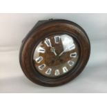 A FRENCH STAINED OAK FARMHOUSE CLOCK