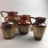 A SET OF THREE DOULTON LAMBETH JUGS AND SIMILAR JAR