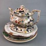 A VICTORIAN TEA POT ON STAND AND VARIOUS CERAMIC PLATES