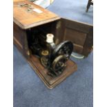 TWO SINGER SEWING MACHINES IN CARRY CASES