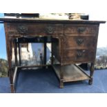 AN EDWARDIAN OAK OBLONG WRITING DESK