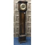 AN OAK CASED GRANDMOTHER CLOCK