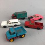 A COLLECTION OF VARIOUS DIE CAST VEHICLES