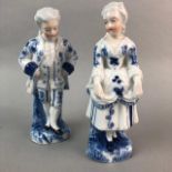 A PAIR OF BLUE AND WHITE CERAMIC FIGURES AND TWO OTHER CERAMIC FIGURES