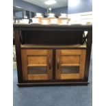 A MODERN STAINED WOOD SIDE CABINET AND A MATCHING CABINET