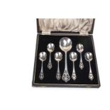 A CASED SET OF SIX SILVER SPOONS AND A SERVING SPOON