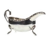 A 20TH CENTURY IRISH SILVER SAUCE BOAT