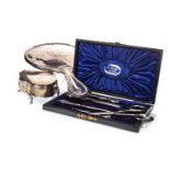 A GEORGE V SILVER TRINKET BOX, A HAND MIRROR AND MANICURE SET