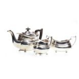 A GEORGE V SILVER THREE PIECE TEA SERVICE