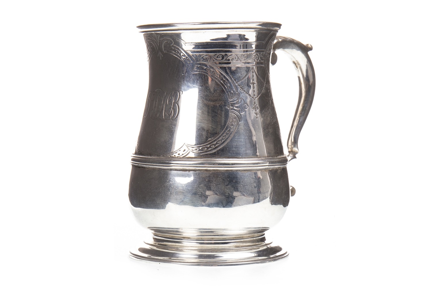 A GEORGE II SILVER TANKARD