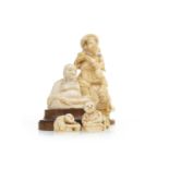 A LATE 19TH CENTURY JAPANESE CARVED IVORY OKIMONO AND OTHER IVORIES
