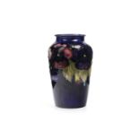 A MOORCROFT 'PANSY' VASE