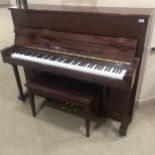 A MAHOGANY CASED UPRIGHT PIANO BY BOYD