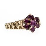 A PURPLE GEM SET FLORAL CLUSTER RING