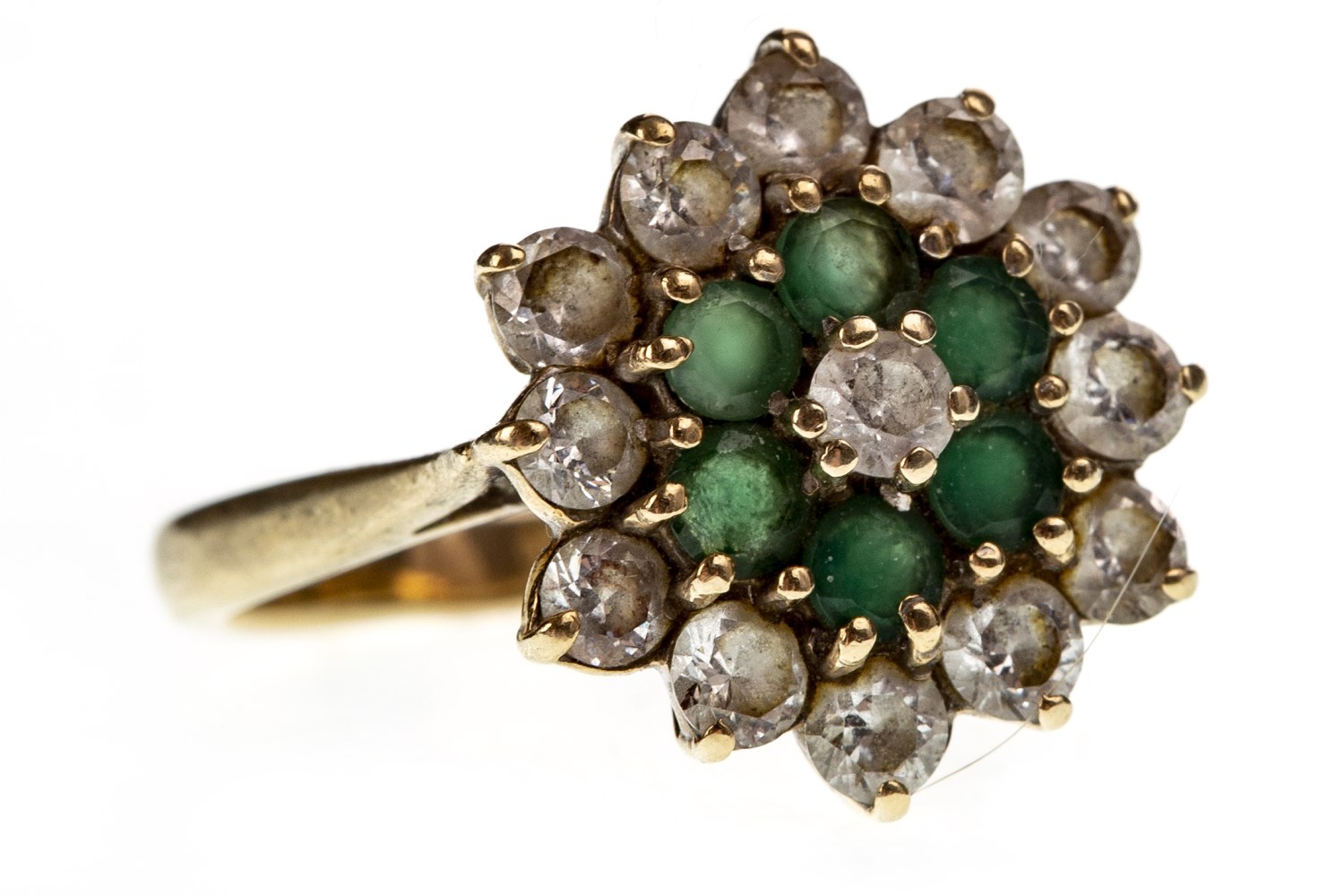 A GREEN AND WHITE GEM SET CLUSTER RING