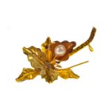 AN ORCHID MOTIF BROOCH