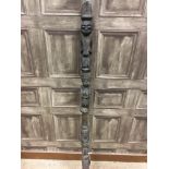 AN AFRICAN CARVED WOOD STAFF