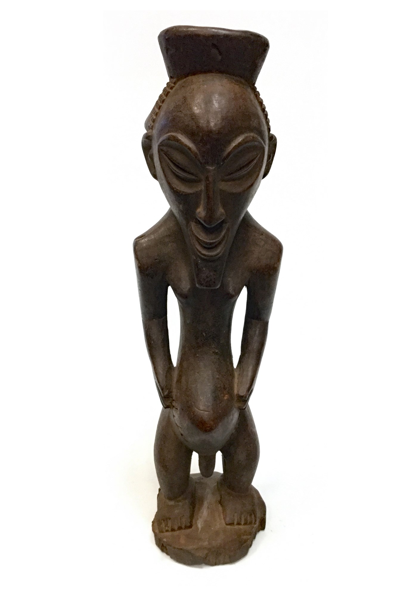 AN AFRICAN CARVED WOOD FIGURE