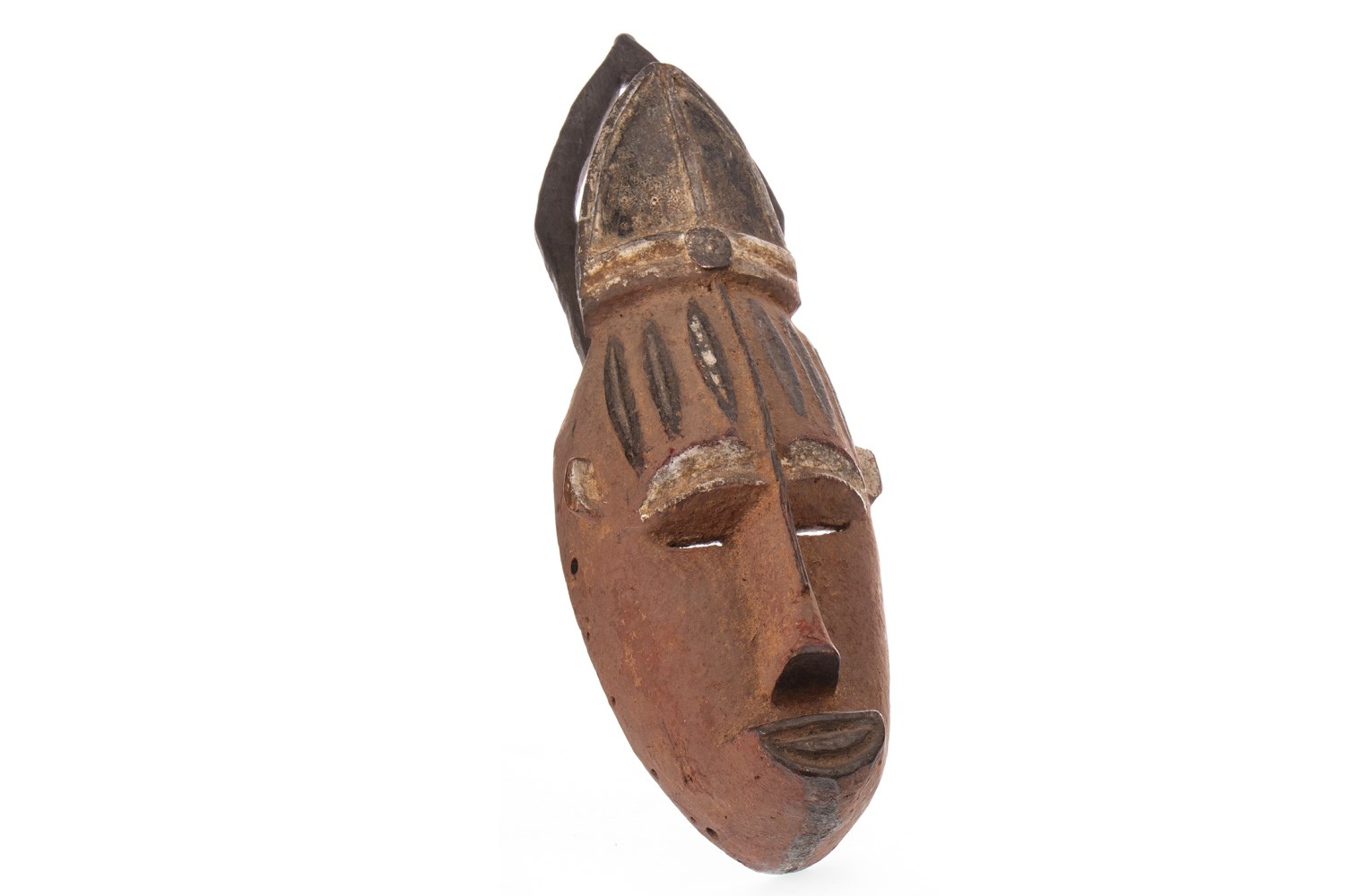 AN AFRICAN CARVED WOOD MASK