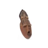 AN AFRICAN CARVED WOOD MASK