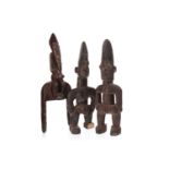 TWO AFRICAN CARVED WOOD FIGURES AND ANOTHER CARVING