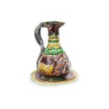 A PORTUGUESE MAJOLICA JUG AND STAND