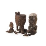 AN AFRICAN CARVED WOOD CUP AND TWO BUSTS