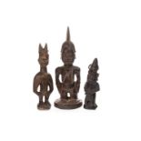 THREE AFRICAN CARVED WOOD FIGURES