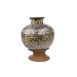 A CHINESE ENAMELLED BRONZE URN ON STAND