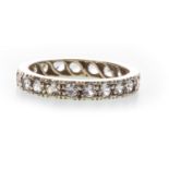 A GEM SET ETERNITY RING