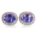 A PAIR OF TANZANITE AND DIAMOND STUD EARRINGS