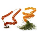 A BEAD NECKLACE AND A SET OF PRAYER BEADS