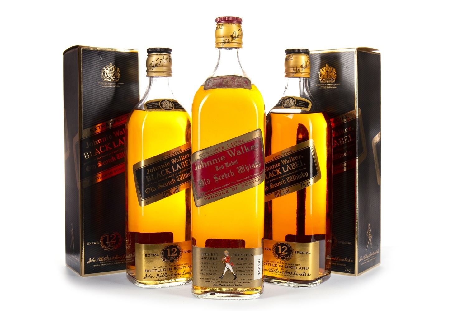 TWO BOTTLES OF JOHNNIE WALKER BLACK LABEL, AND ONE LITRE OF JOHNNIE WALKER RED