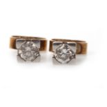 A PAIR OF DIAMOND STUD EARRINGS