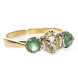 A DIAMOND AND GREEN GEM SET RING