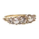 A DIAMOND AND PEARL FIVE STONE RING