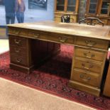 A PARTNERS' LATE VICTORIAN MAHOGANY PEDESTAL DESK