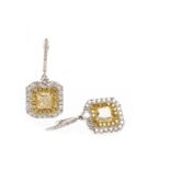 A PAIR OF CERTIFICATED YELLOW AND WHITE DIAMOND EARRINGS