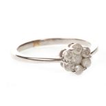 A DIAMOND FLOWER CLUSTER RING