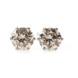 A PAIR OF DIAMOND SINGLE STONE EARRINGS