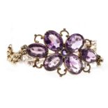 AN EDWARDIAN PURPLE GEM SET BRACELET