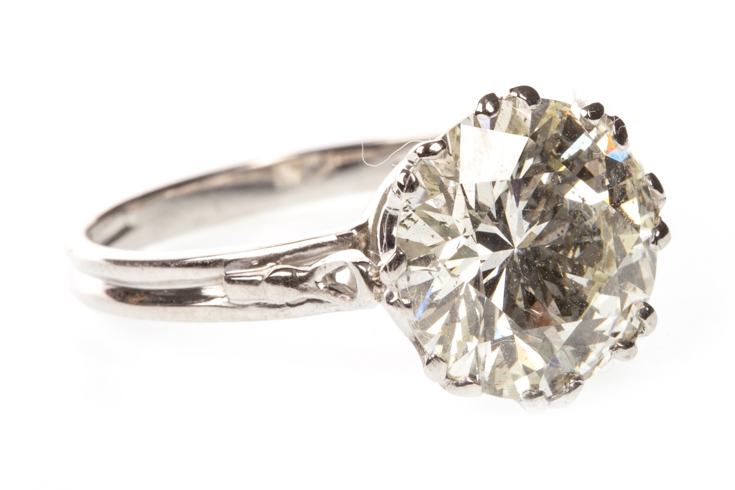 A VERY IMPRESSIVE DIAMOND SOLITAIRE RING