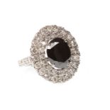 A BLACK AND WHITE DIAMOND RING