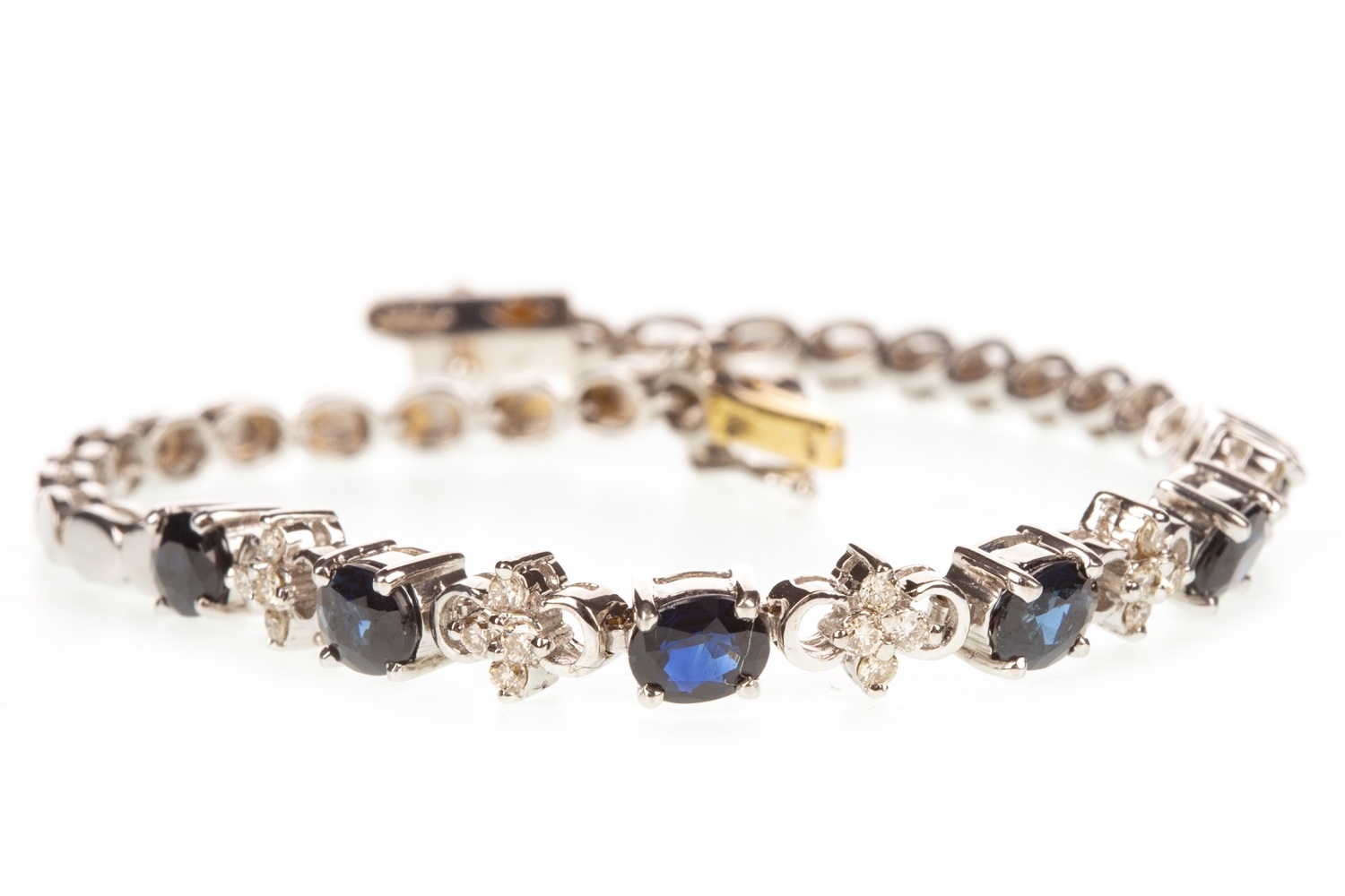 A BLUE GEM AND DIAMOND BRACELET