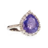 A TANZANITE AND DIAMOND RING