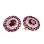 A PAIR OF CERTIFICATED RUBY AND DIAMOND CLUSTER EARRINGS