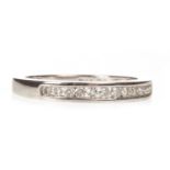 A DIAMOND HALF ETERNITY RING