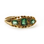 A GREEN GEM SET RING